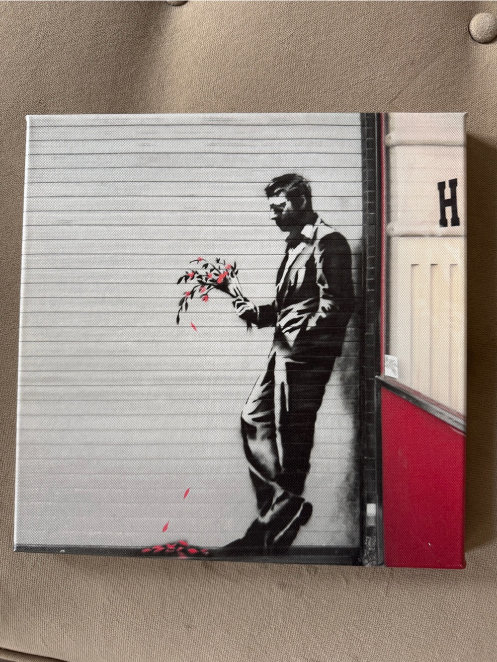 12x12” Banksy "Sad Man with Flowers (Waiting in Vain)" canvas print